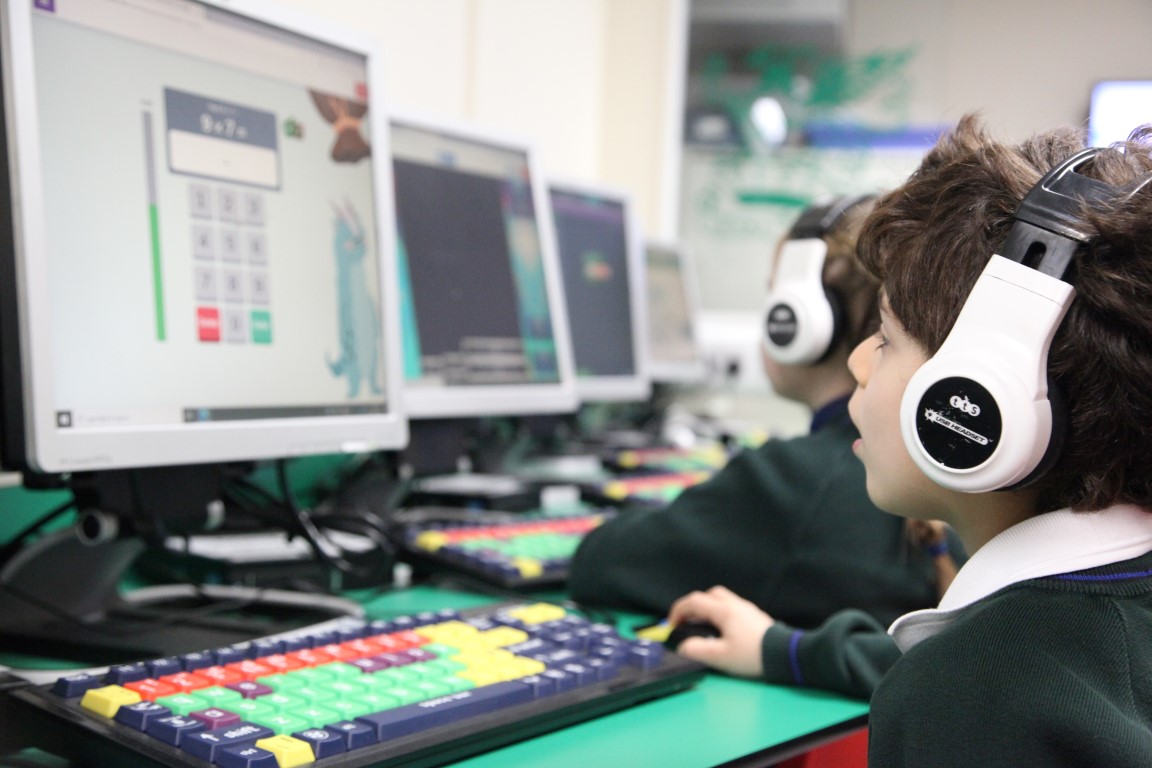 children work on coding skills in the Pre-Prep computing suite