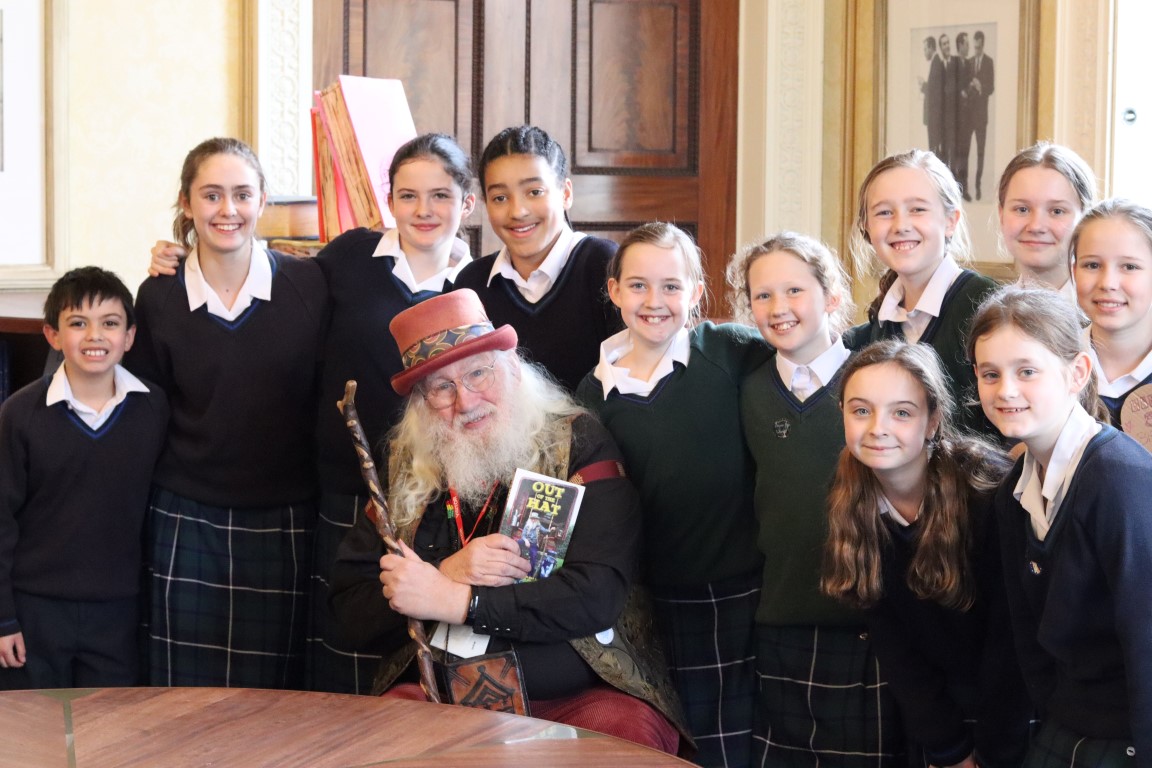 John Row with a group of pupils in Heath Mount's Beaton library named after alumnus Cecil Beaton