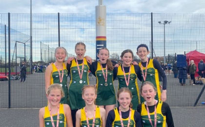 U13 Netball Team With Their Medals Win Place at IAPS National Netball Finals